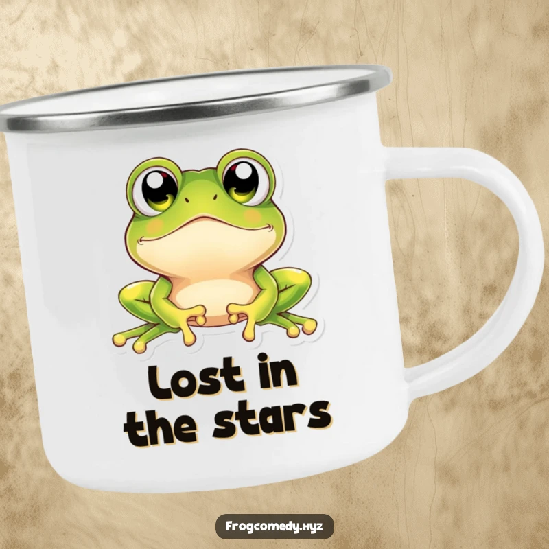 Funny kawaii frog camping mug showing a cute frog with huge, sparkling eyes looking upwards in a charming display of outdoor amazement.