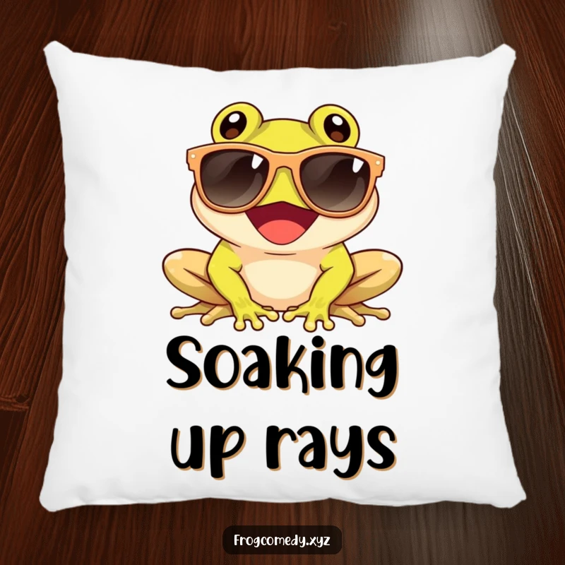 Funny pillow featuring a giggling frog wearing oversized sunglasses and enjoying the sun, offering cozy and cool amphibian decor.