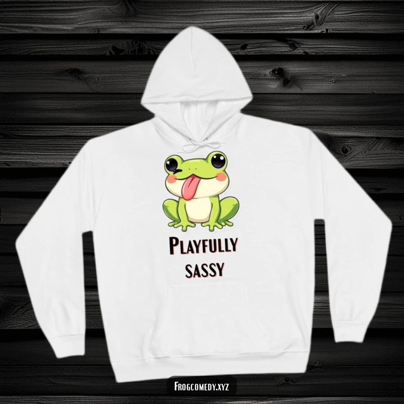 Funny Kawaii frog sticking its tongue out and winking, printed on a warm hoodie, combining comfort with cheeky, playful humor.