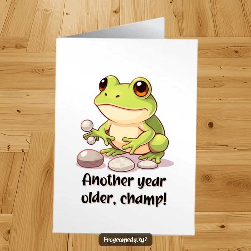 Funny Free Printable Birthday Card: Determined kawaii frog hilariously trying to juggle three shiny pebbles.