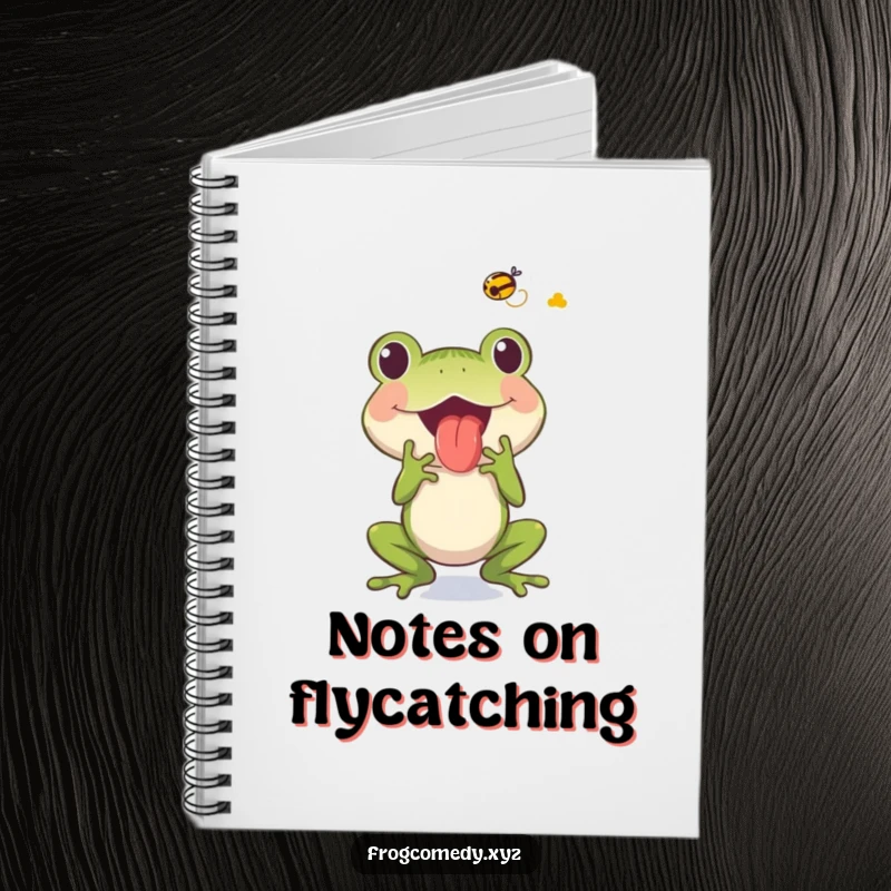 Notebook cover depicting a funny frog character with its tongue extended to catch a fly, ideal for jotting notes.