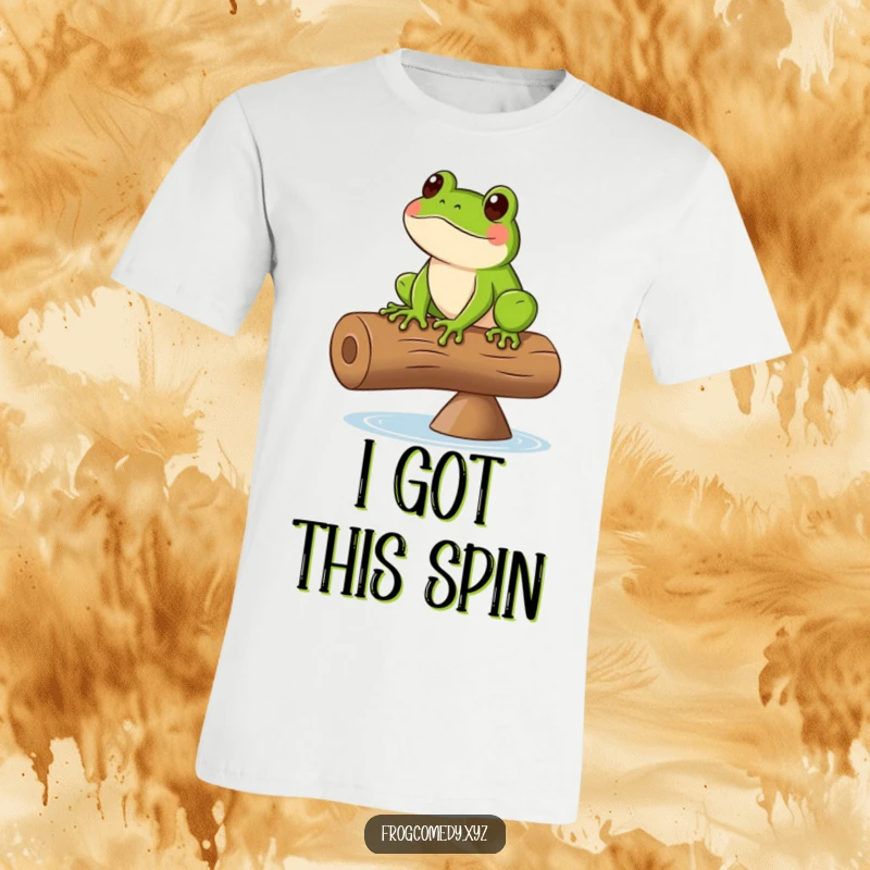 Funny t-shirt depicting a green frog expertly balancing on a spinning log, mid-leap or mid-spin, looking focused.