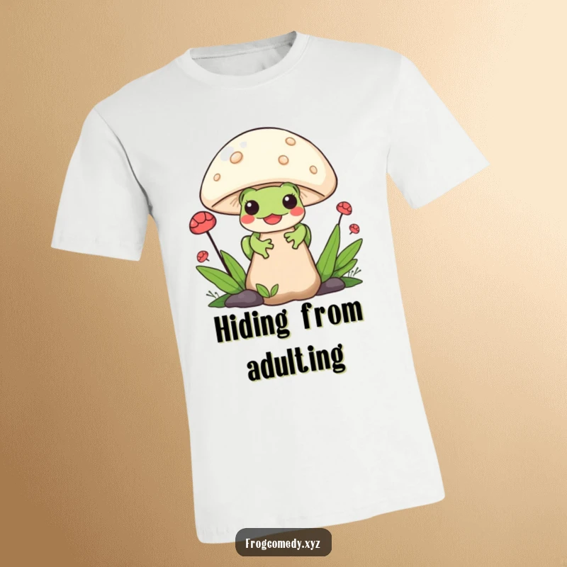 Funny Kawaii Frog T-Shirt: Features a delightful Kawaii frog peeking from behind a large mushroom, perfect for casual wear and nature lovers.